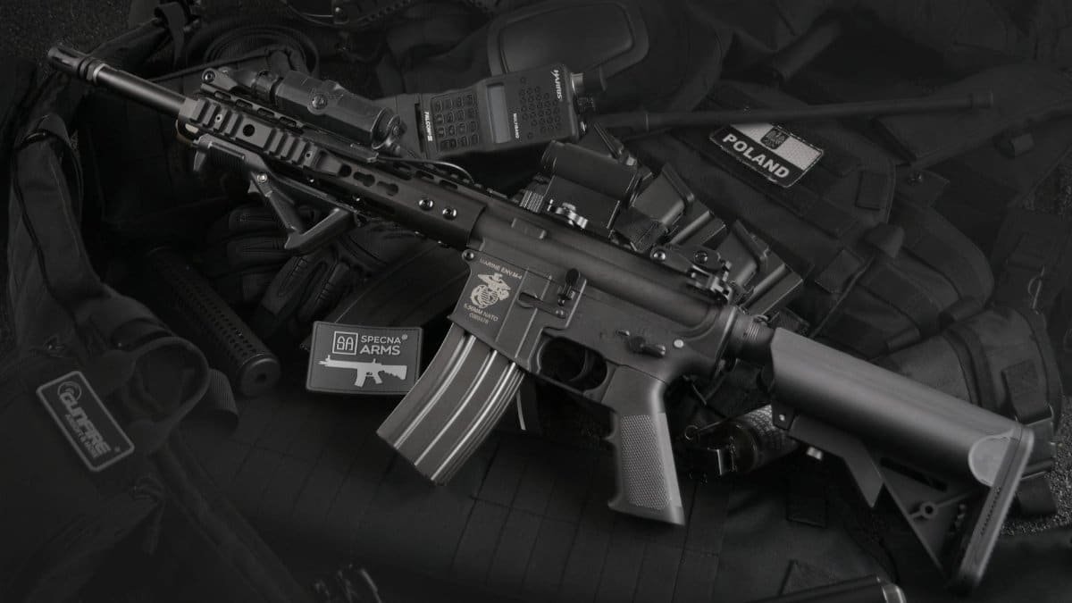 Detailed view of military rifles and tactical equipment, showcasing precision.