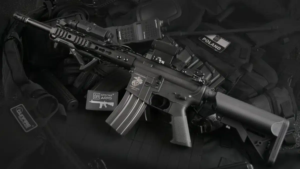 Detailed view of military rifles and tactical equipment, showcasing precision.