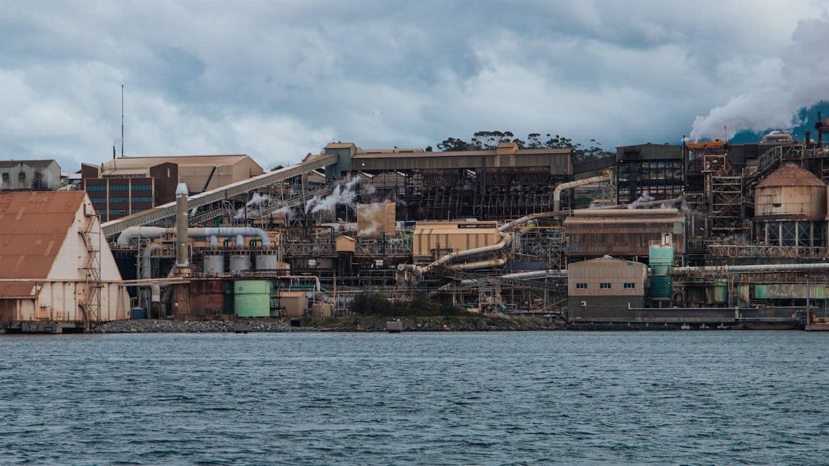 Panoramic view of industrial zinc works along the Derwent River in Hobart, Tasmania.