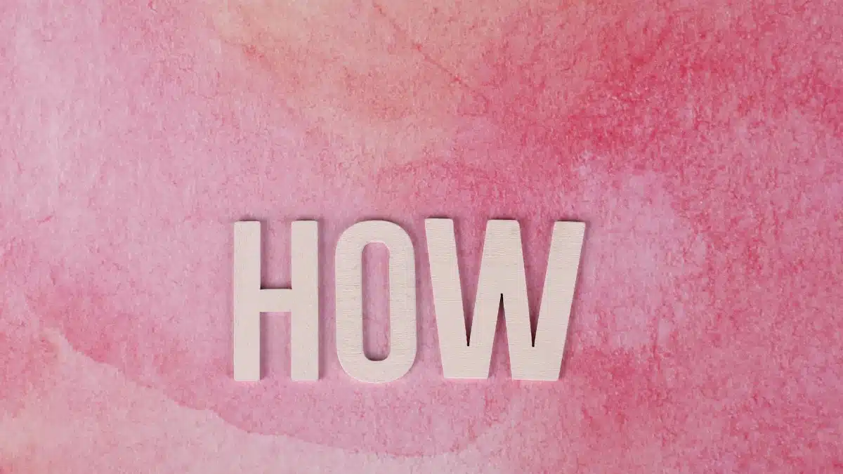Pink watercolor background featuring the word 'HOW' in bold text for conceptual use.