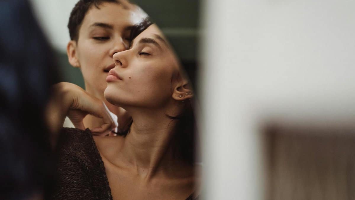 A tender moment captured between a couple showcasing love and intimacy.