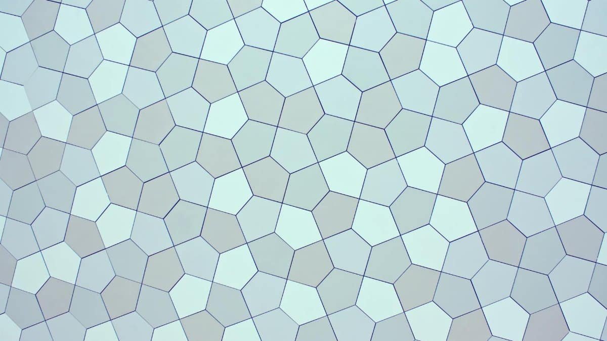 Overhead view of creative abstract backdrop with seamless pattern representing small pentagons with straight lines