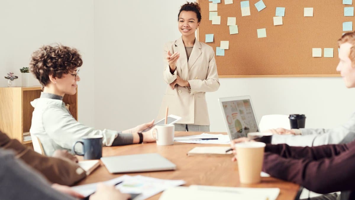 Business team brainstorming and discussing ideas in a modern office setting.