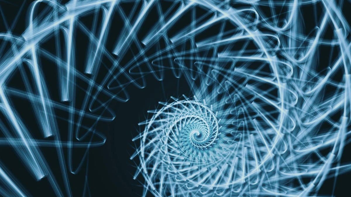 Fascinating blue spiral design with intricate geometric patterns, perfect for creative headers or wallpapers.