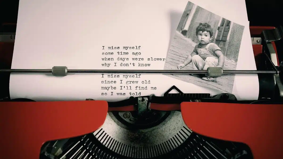 A nostalgic vintage typewriter with a poem and child's photo, evoking memories and the past.