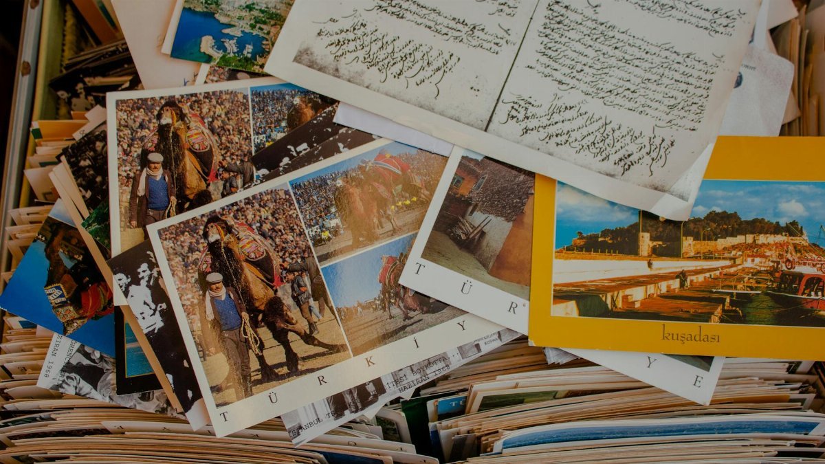 A collection of vintage postcards featuring Turkish cultural images and old documents.