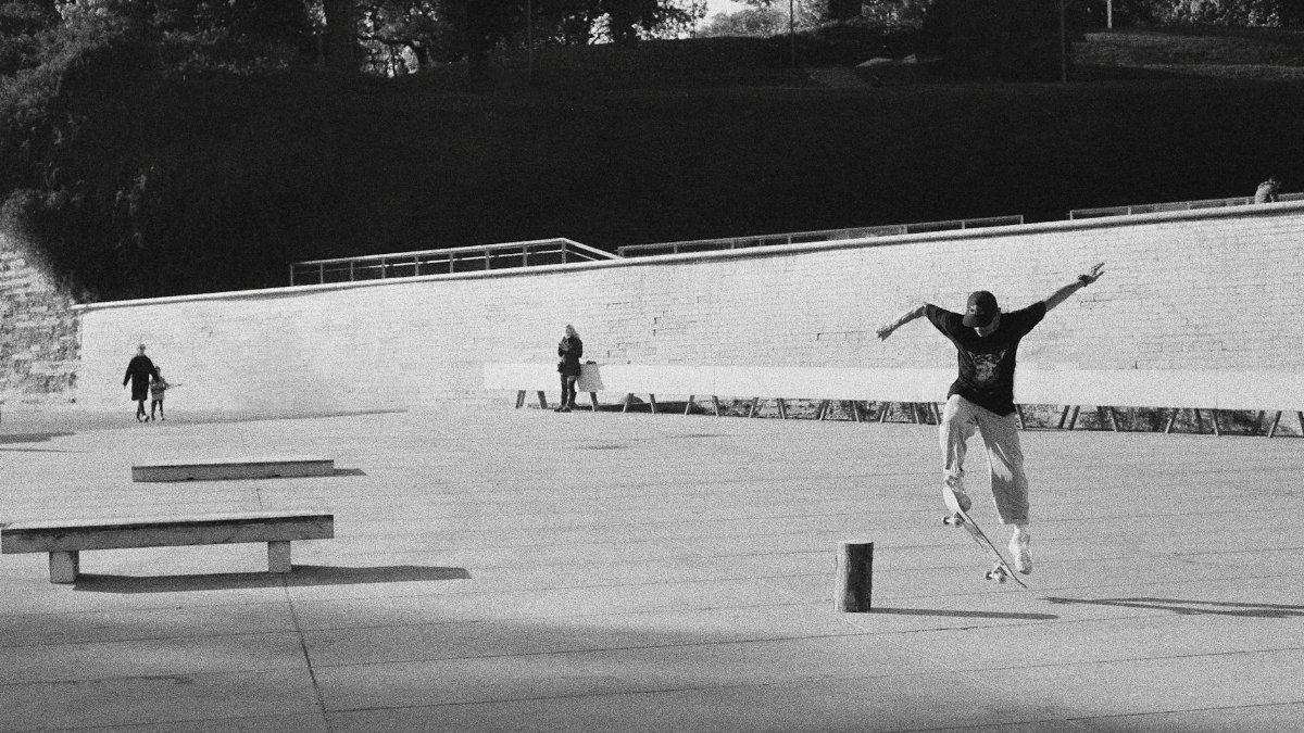 A skateboarder performs a trick in a park in Tallinn, Estonia.