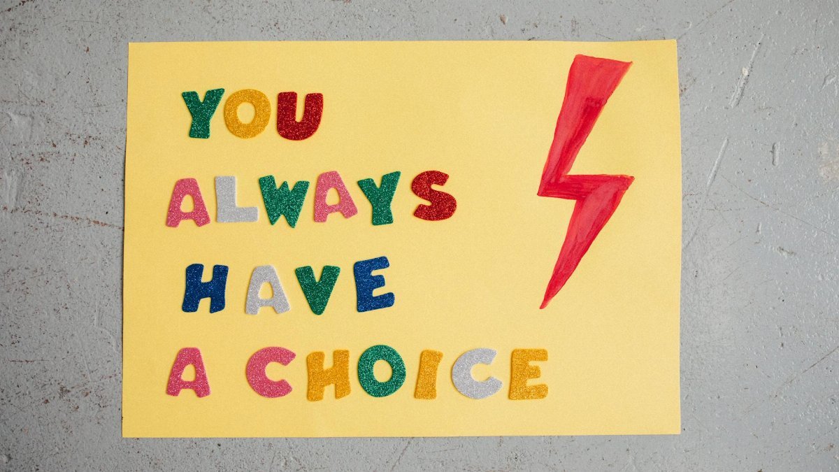 Colorful handmade poster with inspiring message 'You Always Have a Choice' and red lightning bolt.
