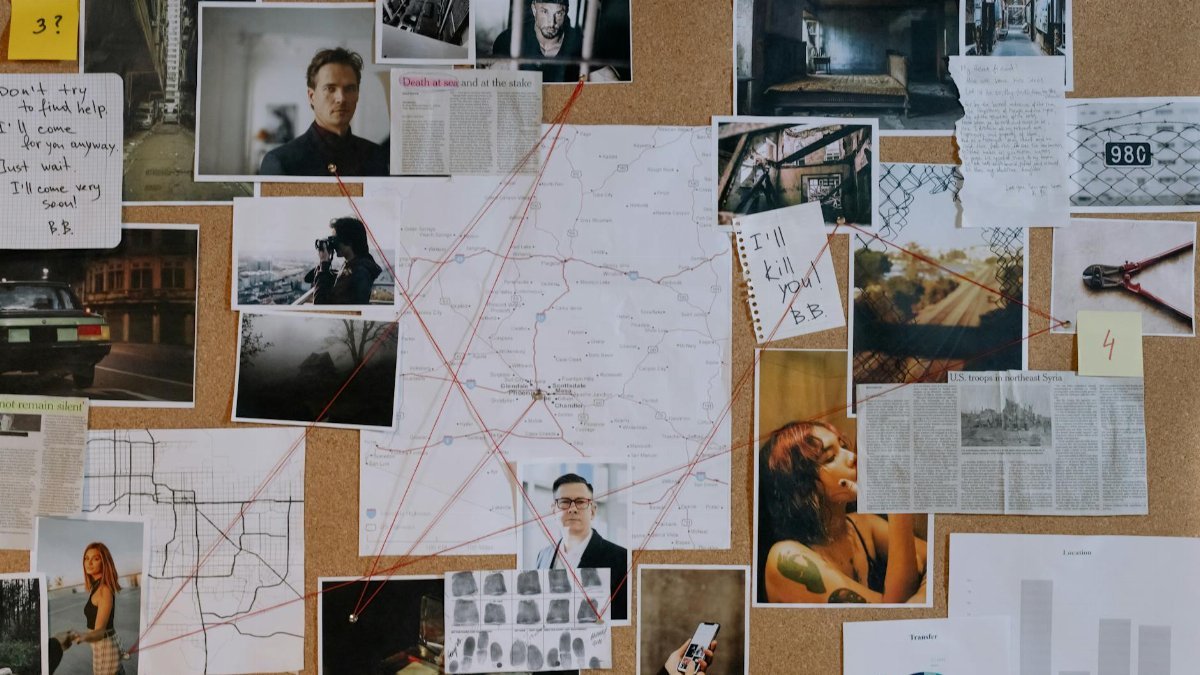 A detailed crime investigation board filled with photos, maps, and red strings connecting clues and evidence.