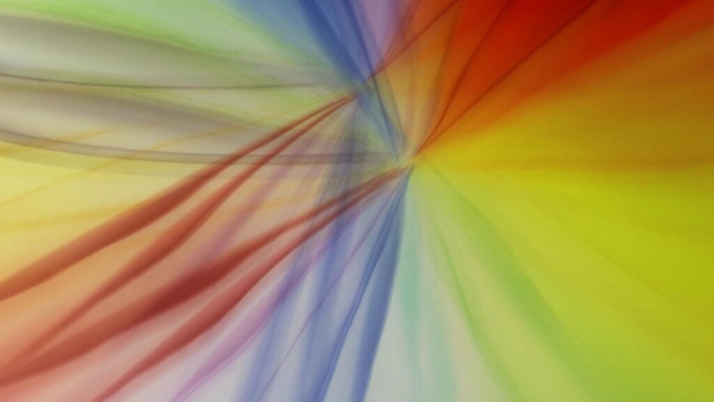 A vivid abstract fractal design blending colors into a dynamic and smooth pattern.