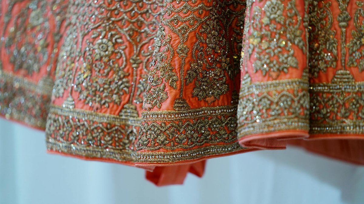 Traditional oriental maxi gown bottom of pink color decorated with ornamental embroidery and shiny beads and sequins
