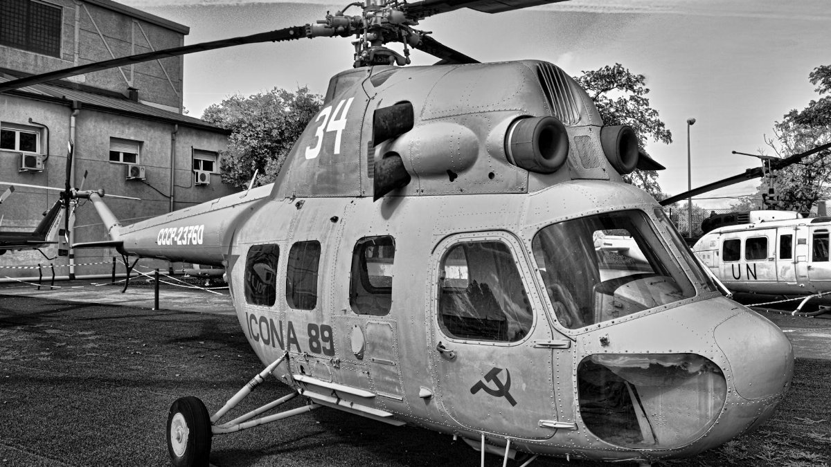 Historic Soviet helicopter with propellers on display in Madrid.