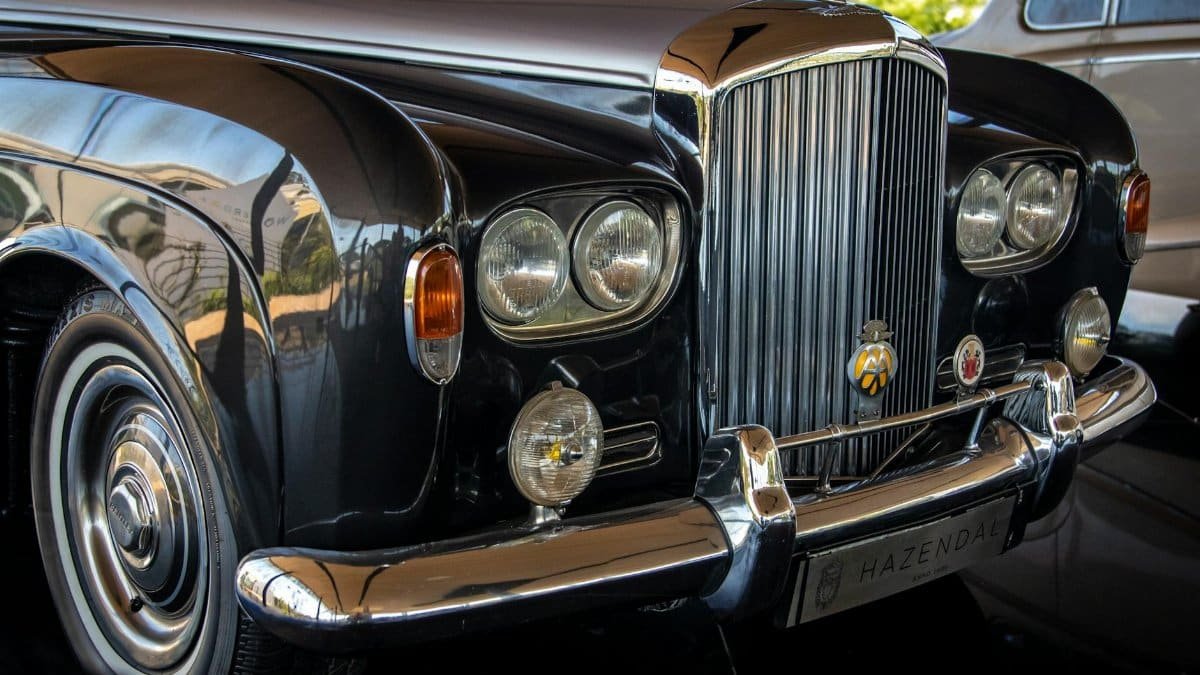 Close-up of a classic black Bentley showcasing luxury and vintage appeal.