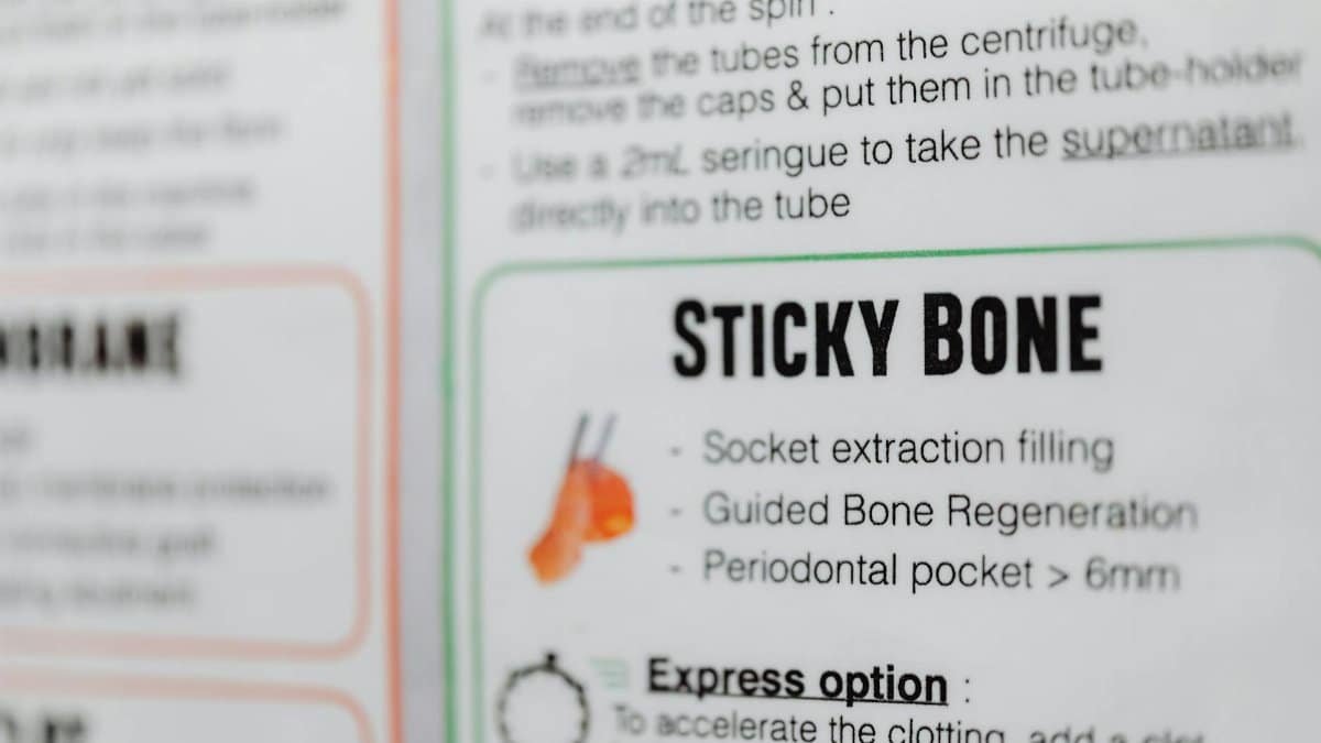 A detailed close-up of medical instructions for sticky bone use in dental care.