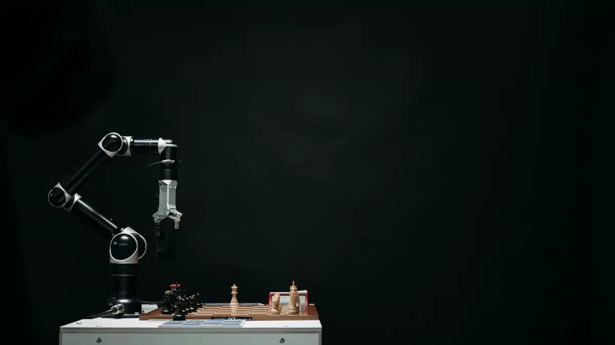 An articulated robotic arm competes in chess on a board against a dark background, highlighting AI and innovation.