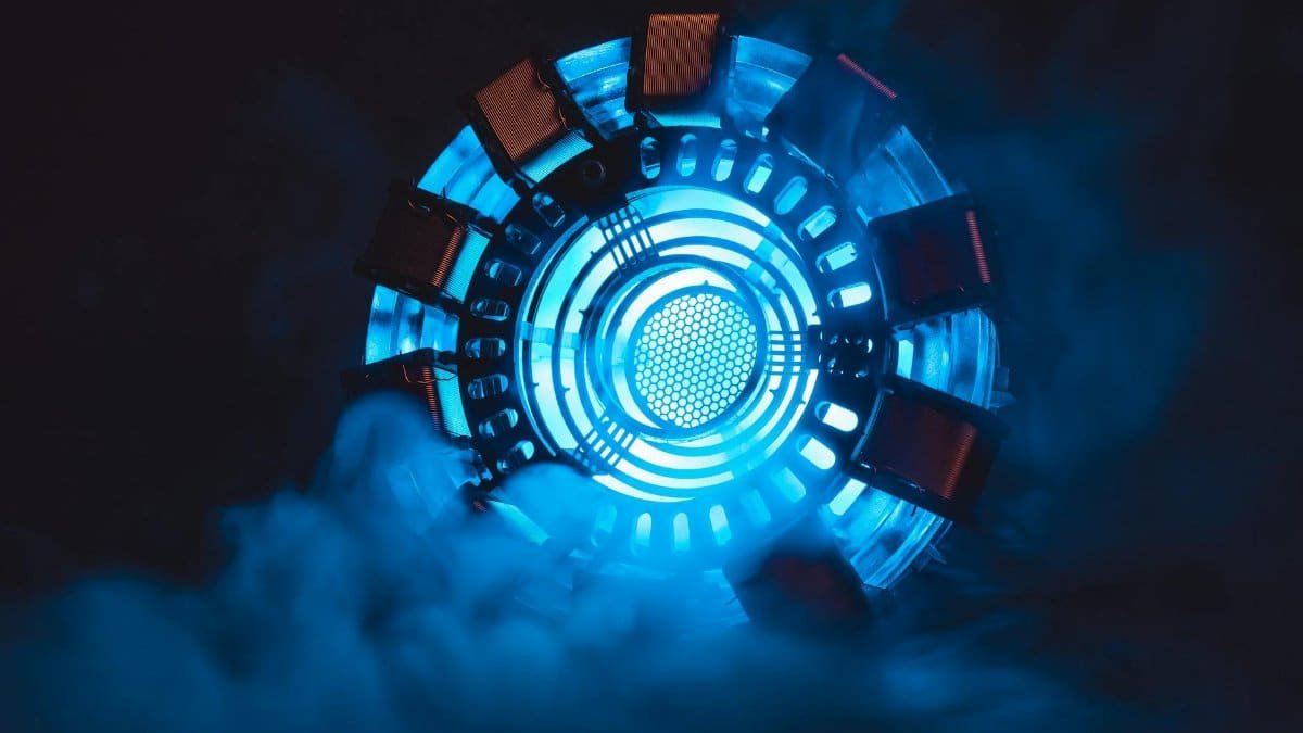 Close-up of a blue illuminated energy core with smoke, creating a sci-fi atmosphere.