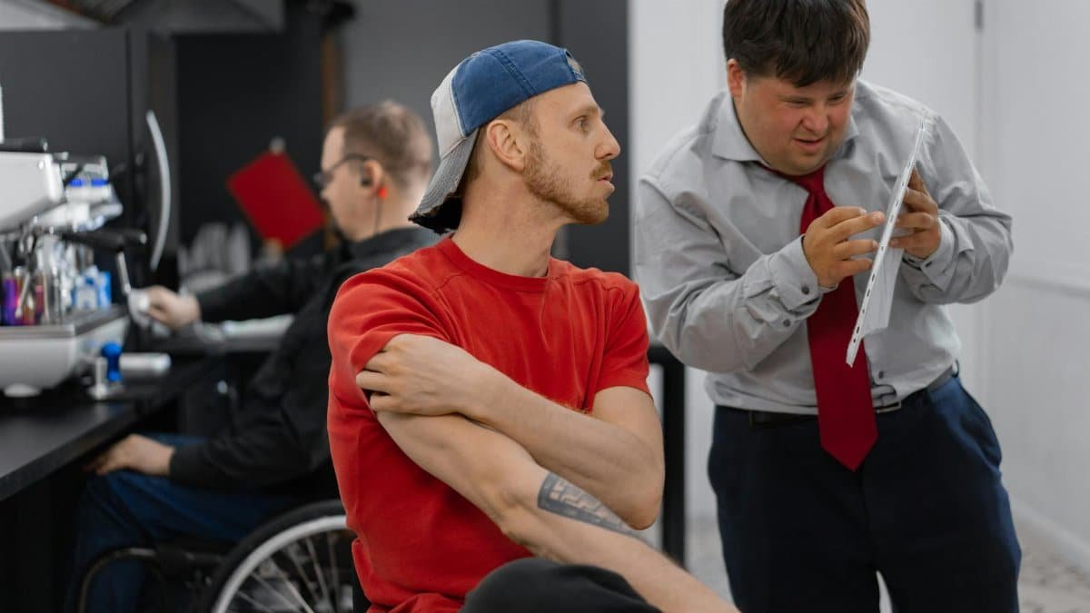 Diverse team working and collaborating in an inclusive office environment.