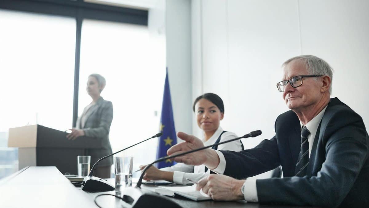 Panelists at an EU conference discussing law and diplomacy.