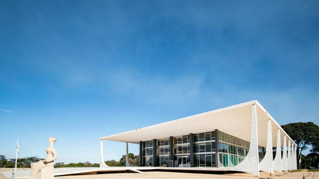 Modernist architecture of Supreme Federal Court, Brasília under clear blue skies.