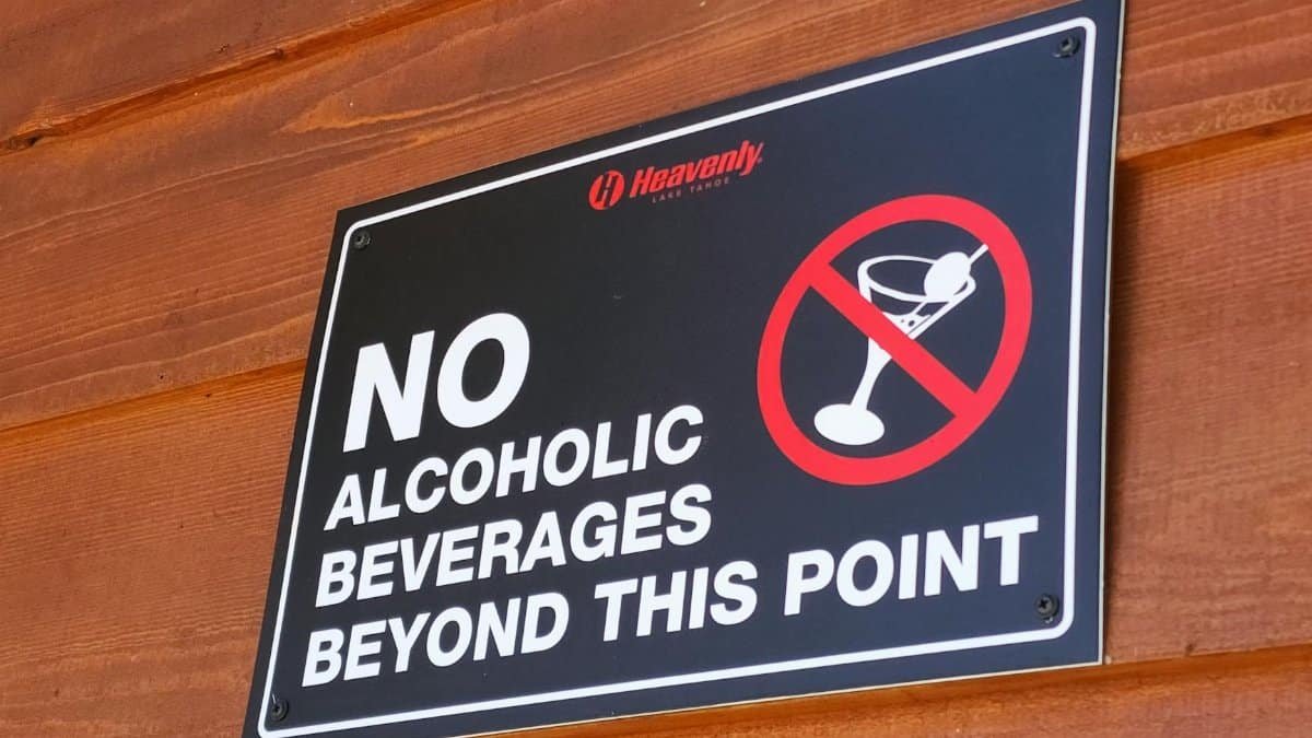 A warning sign prohibiting alcoholic beverages beyond this point at Heavenly Lake Tahoe.