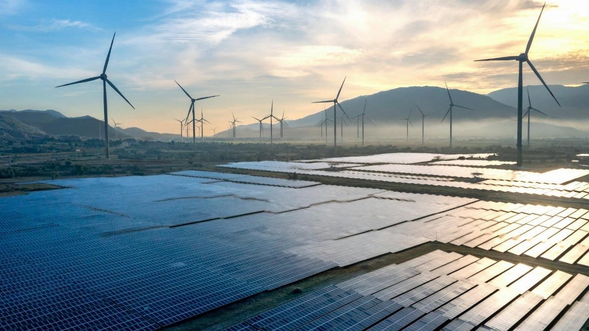 Scenic view of wind turbines and solar panels in Ninh Thuan, Vietnam, capturing sustainable energy efforts.
