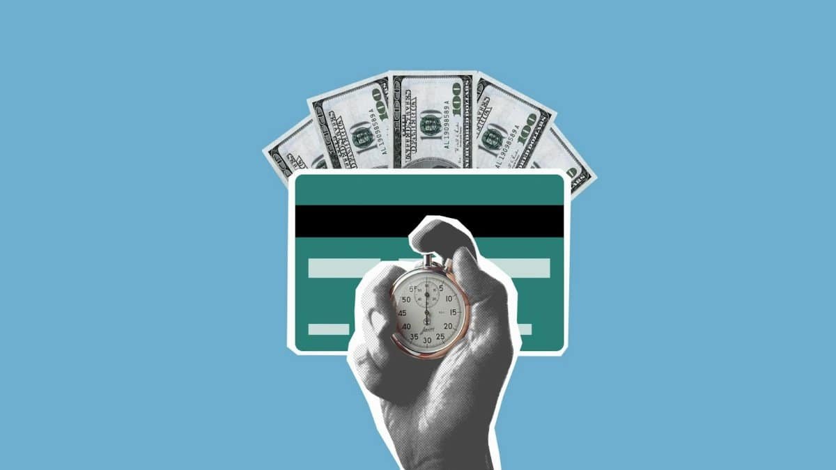 Cut out paper composition of stopwatch in hand of man waiting for money credited to credit card on blue background
