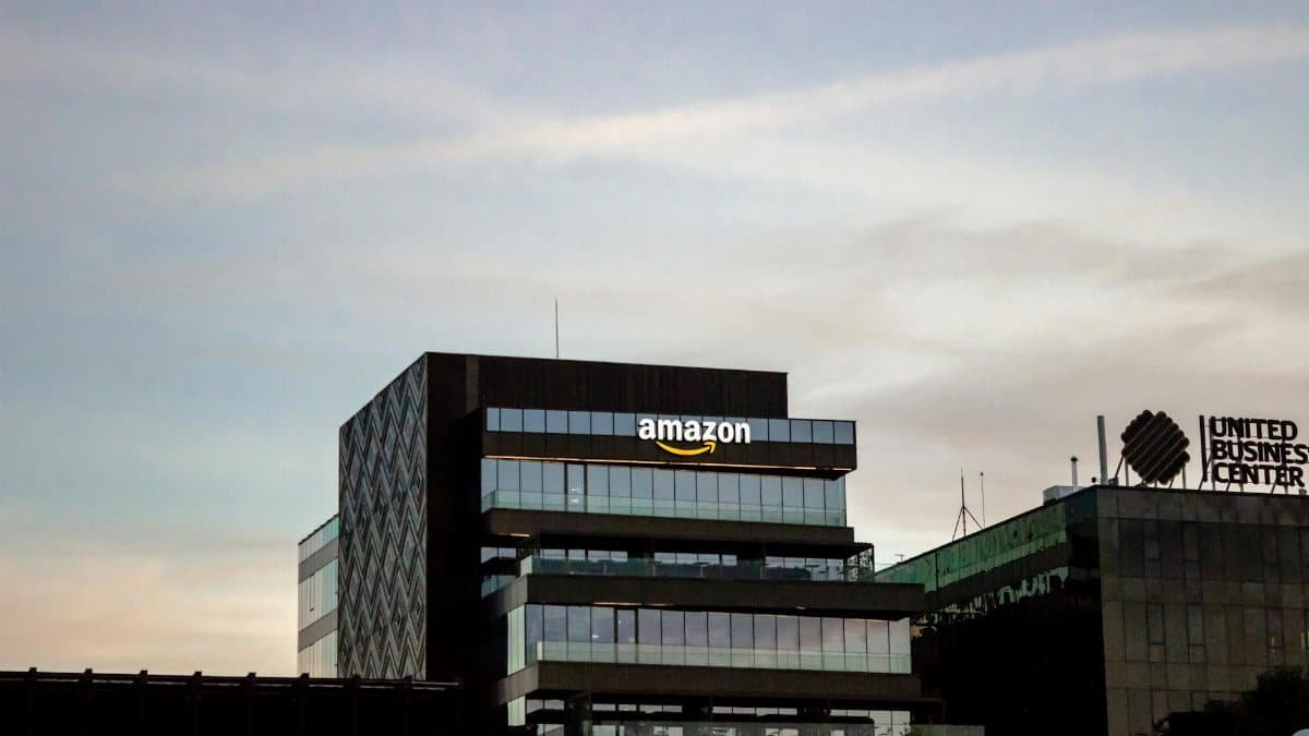 Contemporary architecture showcasing Amazon office at dusk in Iași, Romania.