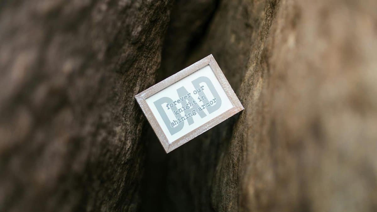 A framed quote about Dad in a rustic, natural setting, perfect for Father's Day.