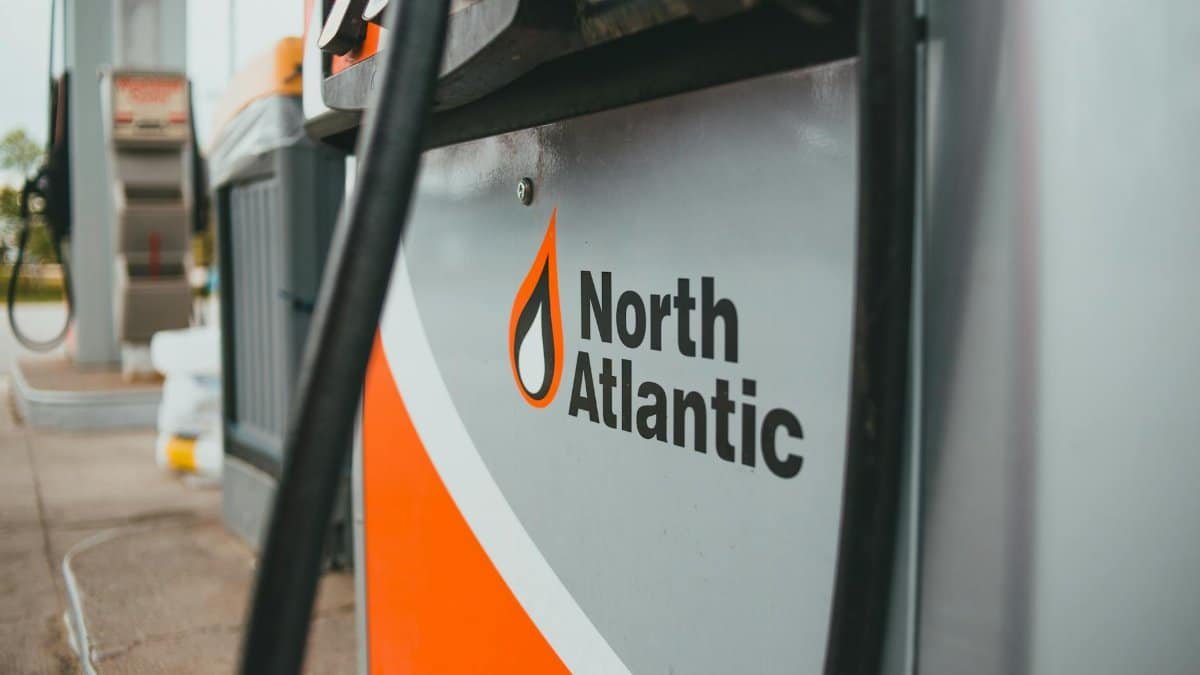 Detailed view of North Atlantic fuel dispenser at an outdoor gas station.