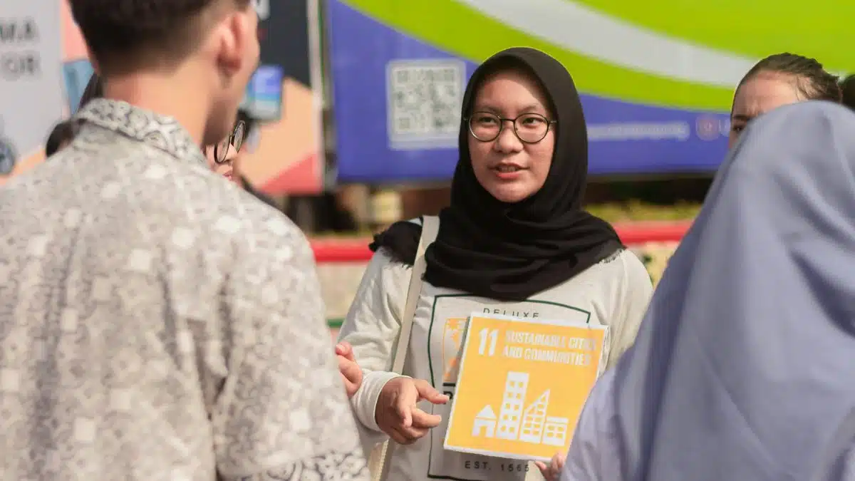 Young people engaging in advocacy for sustainable cities and communities.