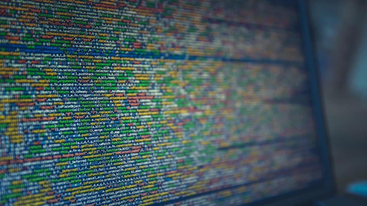 A detailed view of colorful source code displayed on a computer screen, representing modern programming and technology.