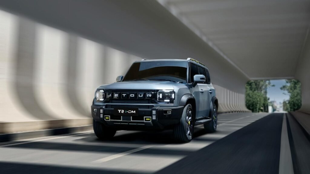 Jetour T2 SUV cruising through a contemporary tunnel, showcasing sleek modern design.