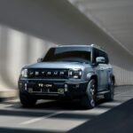 Jetour T2 SUV cruising through a contemporary tunnel, showcasing sleek modern design.