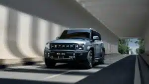Jetour T2 SUV cruising through a contemporary tunnel, showcasing sleek modern design.
