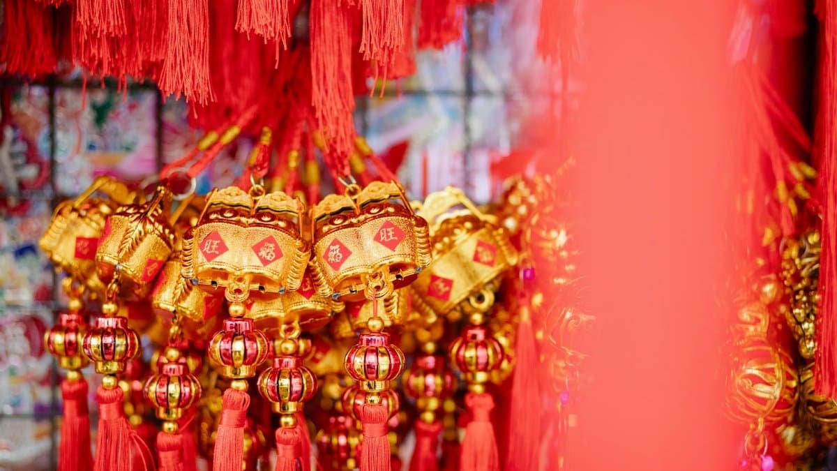 Collection of red and golden Chinese hanging decorations with hieroglyphs for New Year celebration