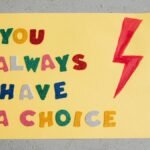 Colorful handmade poster with inspiring message 'You Always Have a Choice' and red lightning bolt.