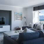 Stylish living room with a view of Table Mountain, blending modern design with natural beauty.