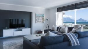 Stylish living room with a view of Table Mountain, blending modern design with natural beauty.