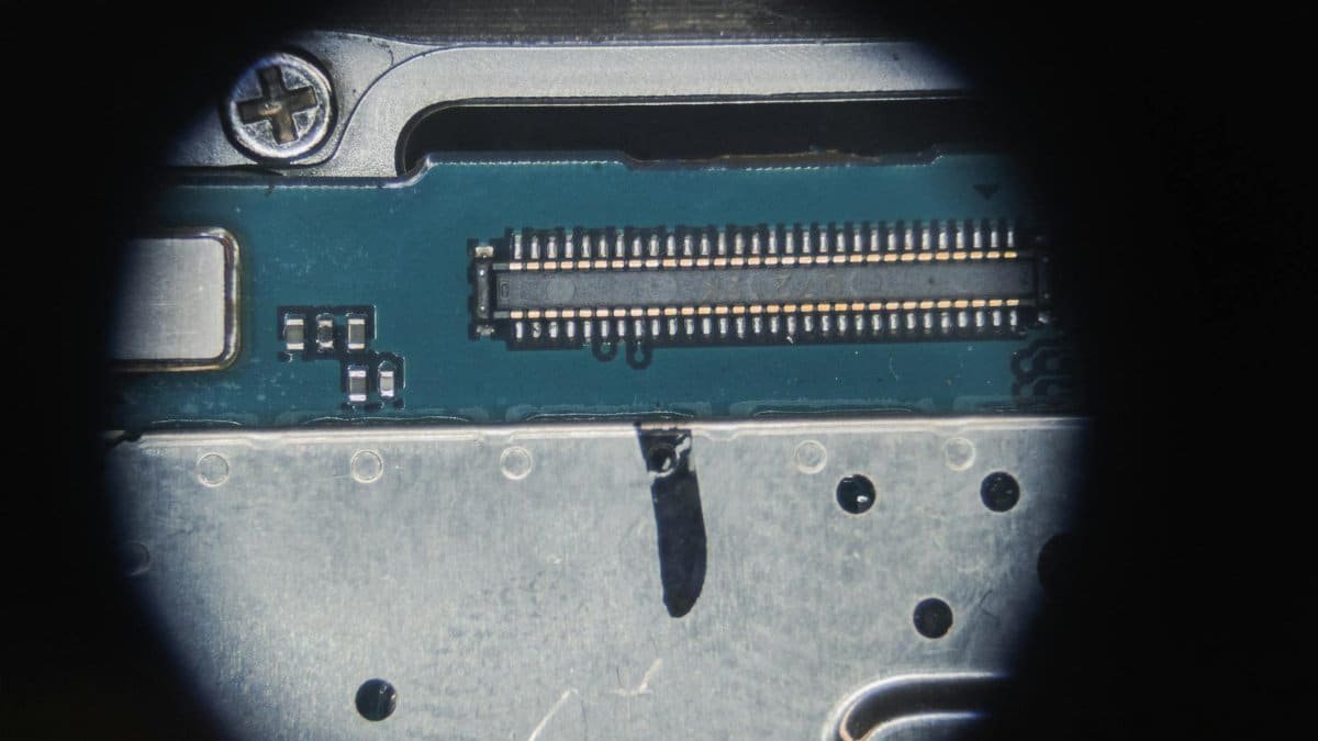Detailed macro of an electronic circuit board showing micro components and connections.