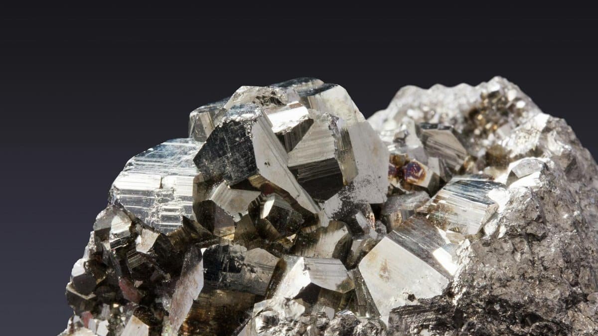 Close-up image of sparkling pyrite crystals showcasing their metallic luster.