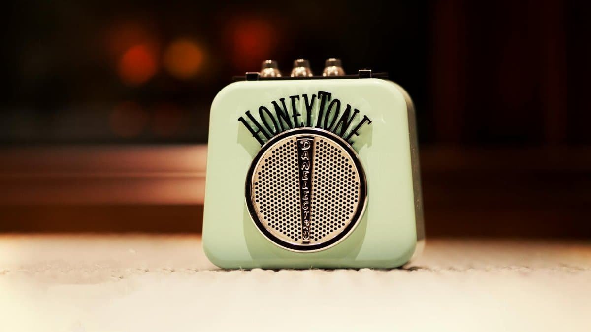 A nostalgic shot of a vintage HoneyTone mini amplifier capturing classic retro vibes.