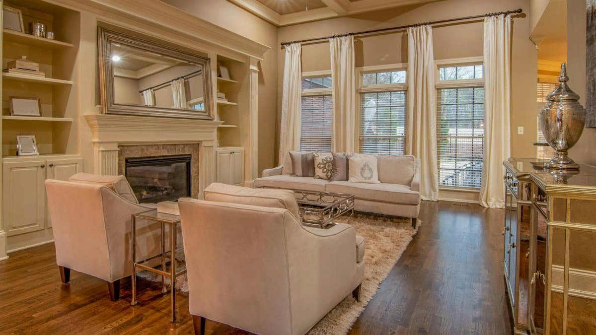 Contemporary living room featuring cozy furniture and a stylish fireplace.