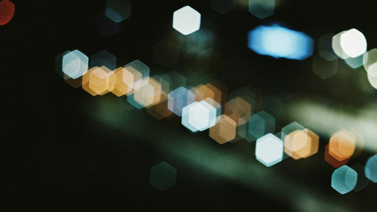 Captivating bokeh of urban city lights at night, creating an abstract, dreamy effect.