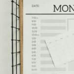 Top view of a minimalist schedule planner with Monday header. Perfect for organizing daily tasks with goals section.