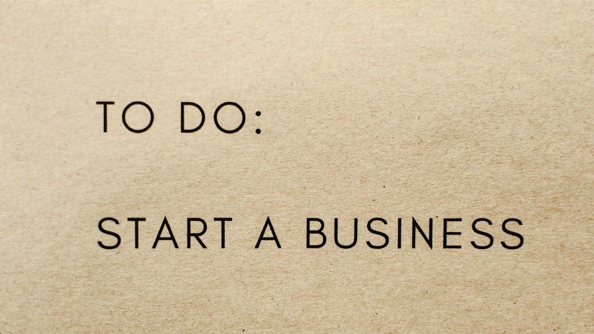 A close-up shot of a to-do list with 'Start a Business' written on it.