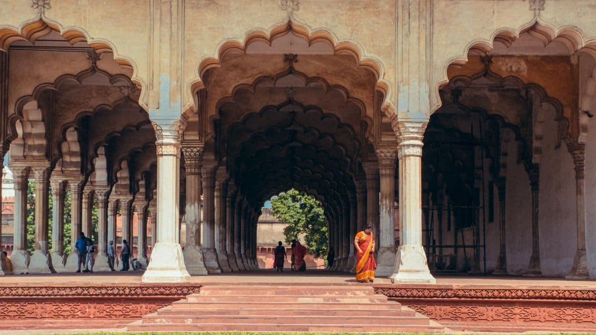The grand arches and columns of Diwan-I-Am at Red Fort beautifully highlight its symmetrical design.