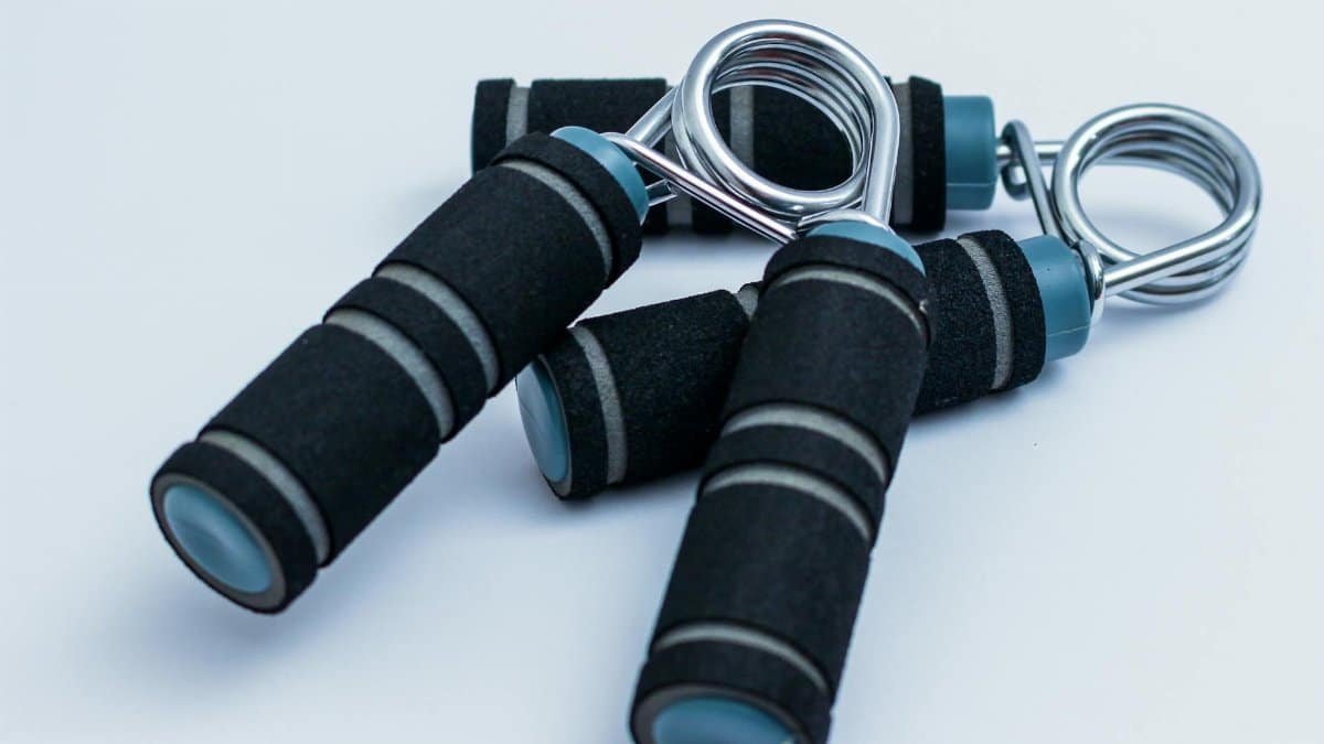 Close-up of foam handle hand grippers for enhancing grip strength during workouts.