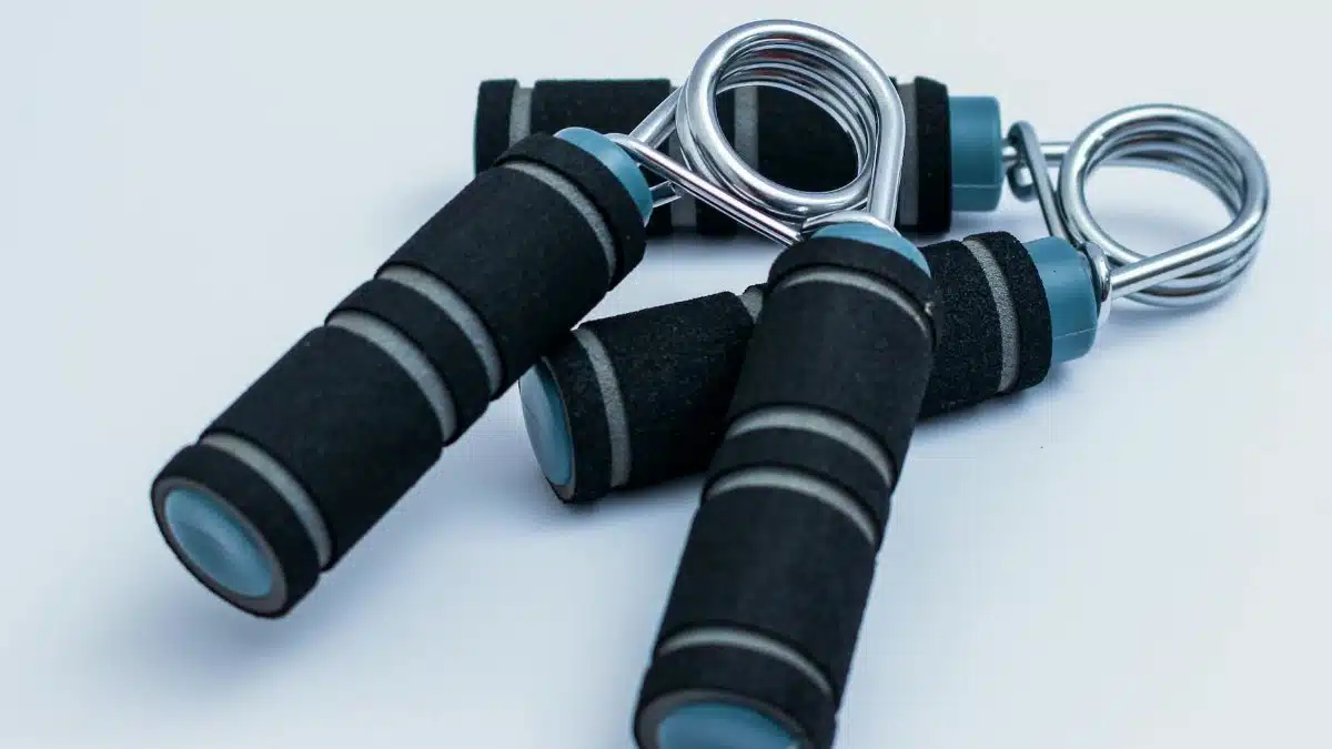 Close-up of foam handle hand grippers for enhancing grip strength during workouts.