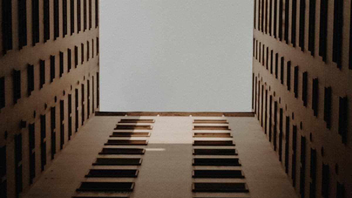Looking up between tall buildings creates an abstract urban scene in São Paulo, Brazil.
