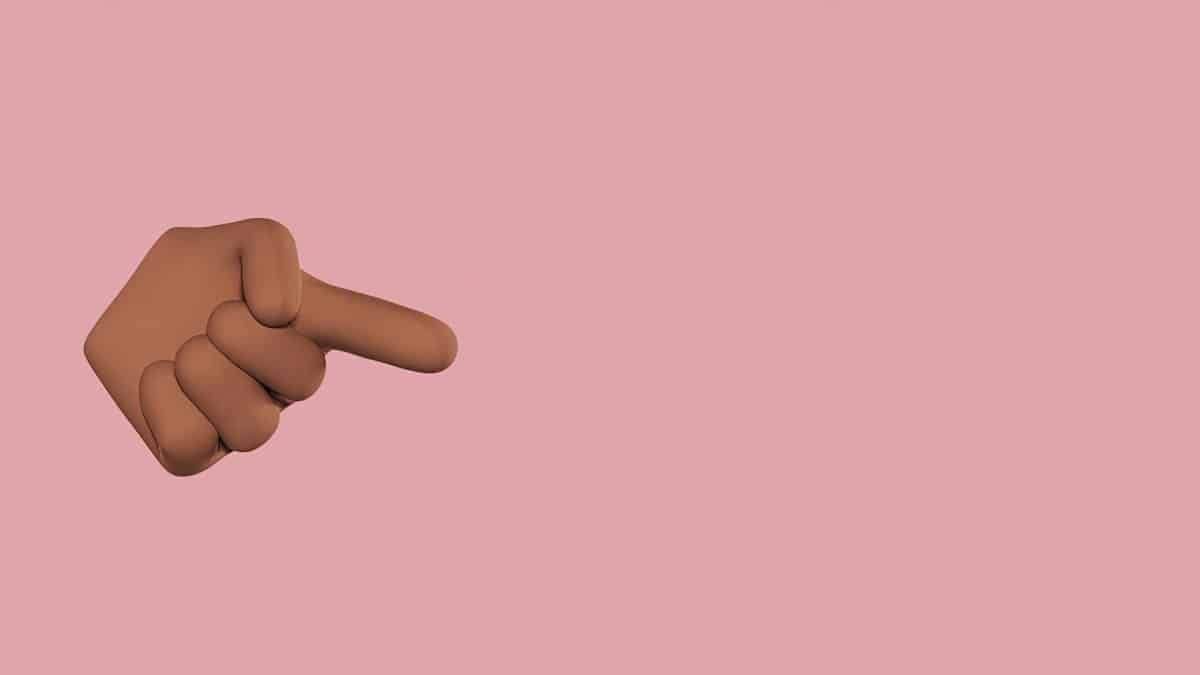 3D digital illustration of a pointing finger on a soft pink background.